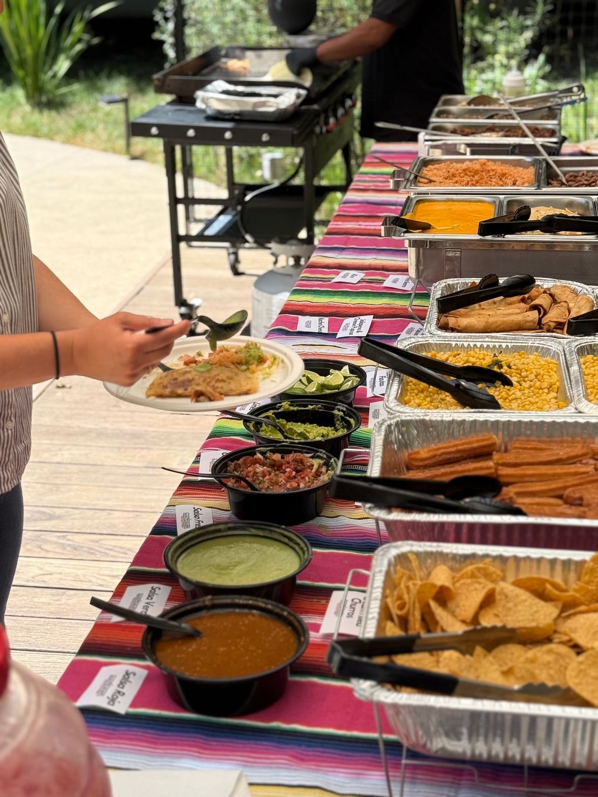 Salsa bar with fresh condiments and toppings